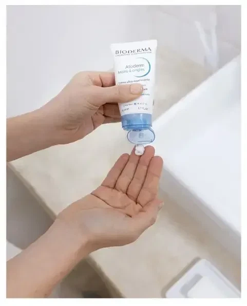 Ультра-живильний крем для рук та нігтів Bioderma Atoderm Mains & ongles Ulra-Nourishing, 50 м - Фото 2 Ультра-живильний крем для рук та нігтів Bioderma Atoderm Mains & ongles Ulra-Nourishing, 50 м - зображення 2