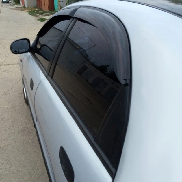 Дефлектори вікон вітровики для Daewoo Lanos 1998- Широкі 4 шт (Auto Clover) - изображение 2