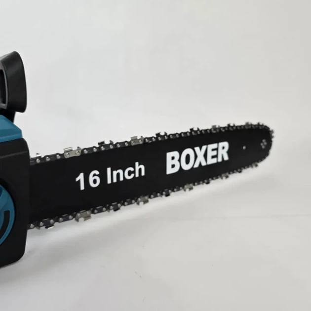 Електропила мережева Boxer BX 3306 2200 Вт шина 40 см автоматичне змащення ланцюга металева для розпилювання деревини заготівлі дров обрізання дерев і господарських робіт - Фото 6 Електропила мережева Boxer BX 3306 2200 Вт шина 40 см автоматичне змащення ланцюга металева для розпилювання деревини заготівлі дров обрізання дерев і господарських робіт - зображення 6