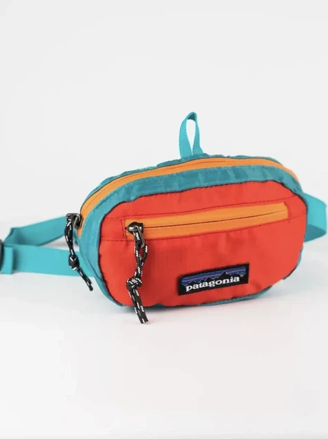 Сумка через плечо/на пояс Patagonia Ultralight Hole Mini Hip Pack бирюзово-красного цвета. - Фото 3 Сумка через плечо/на пояс Patagonia Ultralight Hole Mini Hip Pack бирюзово-красного цвета. - изображение 3