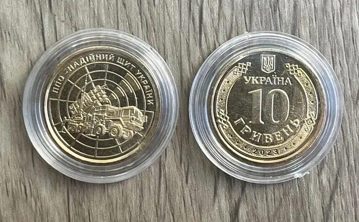 ПОЗОЛОТА ППО – надійний щит України 10 гривень 2023 року Пам'ятна монета - Фото 1 ПОЗОЛОТА ППО – надійний щит України 10 гривень 2023 року Пам'ятна монета - зображення 1