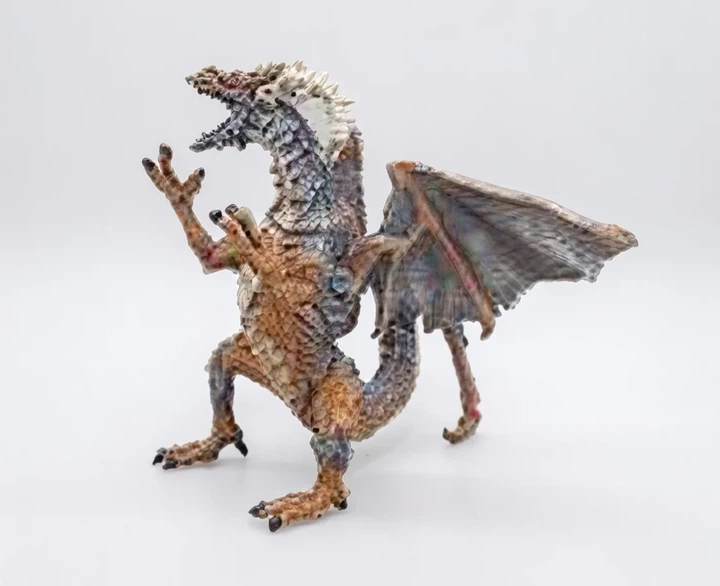 Фигурка дракона коричнево-синего Dino Toys 56436, в оконной коробке - Фото 1 Фигурка дракона коричнево-синего Dino Toys 56436, в оконной коробке - изображение 1