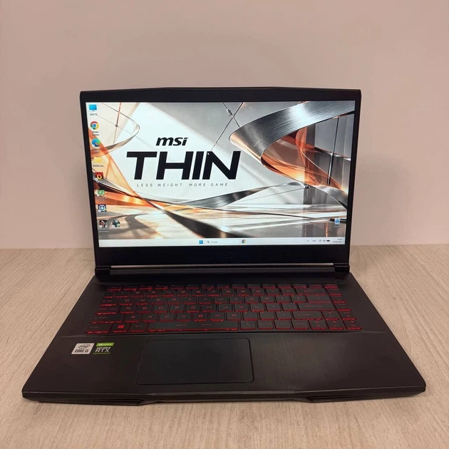 Игровой ноутбук MSI GF65 Thin 10UE / 15.6" (1920x1080) IPS / Intel Core i5-10500H (6 (12) ядер по 2.5 - 4.5 GHz) / 8 GB DDR4 / 512 GB SSD NVMe / nVidia GeForce RTX 3060, 6 GB GDDR6, 192-bit / WebCam б/у - Фото 2 Игровой ноутбук MSI GF65 Thin 10UE / 15.6" (1920x1080) IPS / Intel Core i5-10500H (6 (12) ядер по 2.5 - 4.5 GHz) / 8 GB DDR4 / 512 GB SSD NVMe / nVidia GeForce RTX 3060, 6 GB GDDR6, 192-bit / WebCam б/у - изображение 2