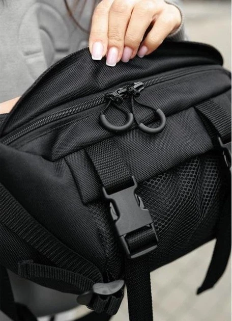 Велика жіноча поясна сумка бананка з поліестеру міська Sambag DynamicDart трансформер, чорна 60506 - Фото 6 Велика жіноча поясна сумка бананка з поліестеру міська Sambag DynamicDart трансформер, чорна 60506 - зображення 6