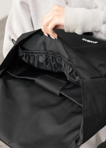 Жіноча сумка для ноутбука Sambag 33х26х11 см екошкіра з перфорацією чорна - Фото 6 Жіноча сумка для ноутбука Sambag 33х26х11 см екошкіра з перфорацією чорна - зображення 6