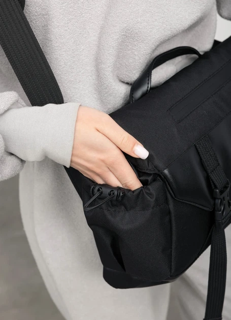 Жіноча сумка для ноутбука Sambag 33х26х11 см екошкіра з перфорацією чорна - Фото 7 Жіноча сумка для ноутбука Sambag 33х26х11 см екошкіра з перфорацією чорна - зображення 7
