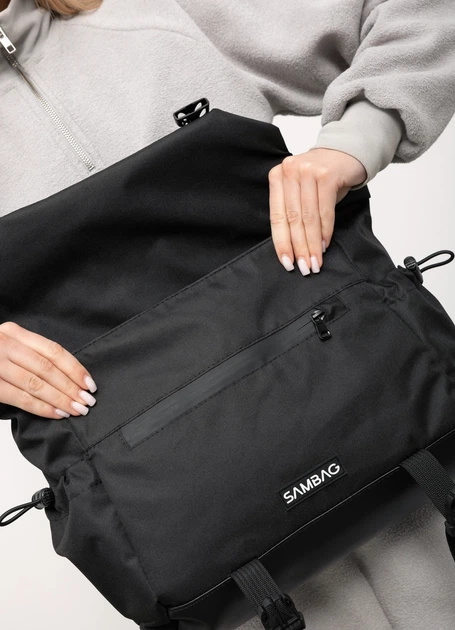 Жіноча сумка для ноутбука Sambag 33х26х11 см екошкіра з перфорацією чорна - Фото 9 Жіноча сумка для ноутбука Sambag 33х26х11 см екошкіра з перфорацією чорна - зображення 9