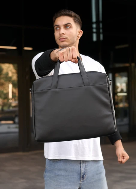 Сумка для ноутбука Sambag Roll з перфорацією 35х28х5 см чорна екошкіра - Фото 1 Сумка для ноутбука Sambag Roll з перфорацією 35х28х5 см чорна екошкіра - зображення 1