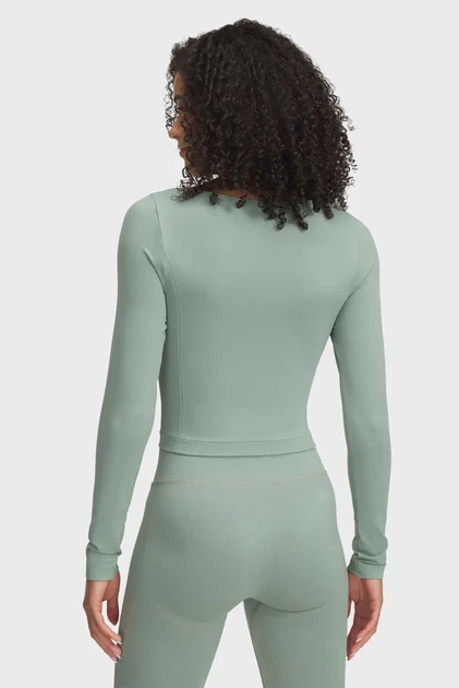 Жіночий м'ятний лонгслів UA Vanish Seamless LS Under Armour M 1379150-348 - Фото 2 Жіночий м'ятний лонгслів UA Vanish Seamless LS Under Armour M 1379150-348 - зображення 2