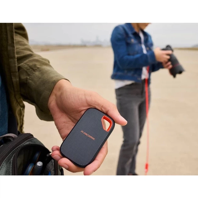 Зовнішній SanDisk SSD Extreme Portable Tripel USB 1 ТБ 2000 МБ/с читання 1800 МБ/с запис (619659223151) - Фото 5 Зовнішній SanDisk SSD Extreme Portable Tripel USB 1 ТБ 2000 МБ/с читання 1800 МБ/с запис (619659223151) - зображення 5