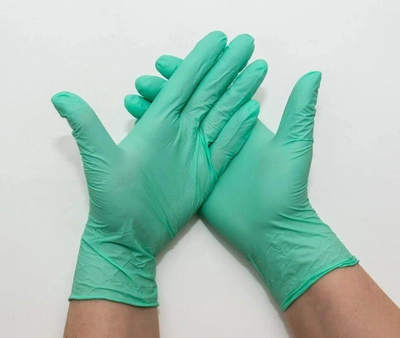 Перчатки нитриловые Unex размер XS 100 штук Зеленые