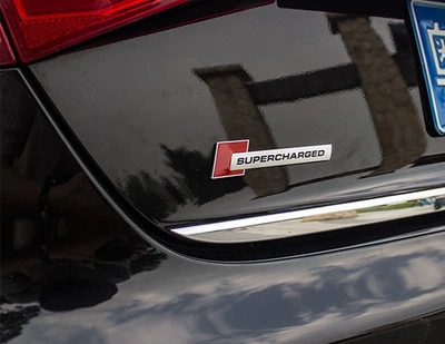 Шильдик/емблема/напис на багажник та крила Supercharger на AUDI S&T
