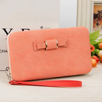 Модний жіночий клатч із бантиком персиковий Store