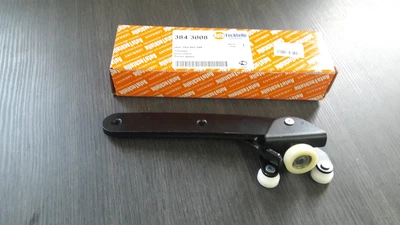 Ролик двери боковой нижний правый AUTOTECHTEILE 384 3008 с кронштейном VOLKSWAGEN CADDY 03->
