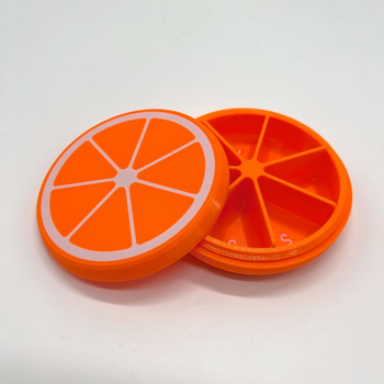 Таблетка органайзер на 7 відділень кругла Апельсин