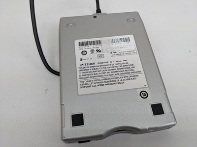 Внешний привод FDD Mitsumi D353FUE, USB2.0, серебристый Б/У
