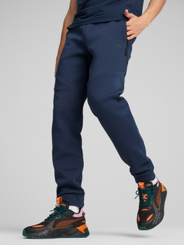 Spodnie sportowe męskie Puma Tech Track Pant 62438814 L Granatowe (4067981025503)