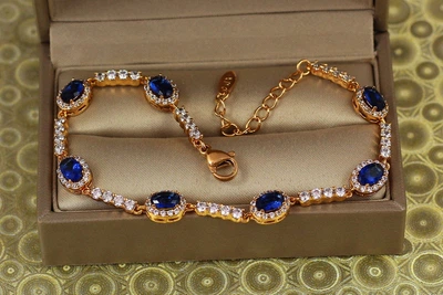 Браслет Xuping Jewelry малинки с синими камнями на дорожке 17,5 см 7 мм золотистый