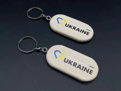 Брелок деревянный с гравировкой овал Stand with Ukraine 65х30мм BR-711.