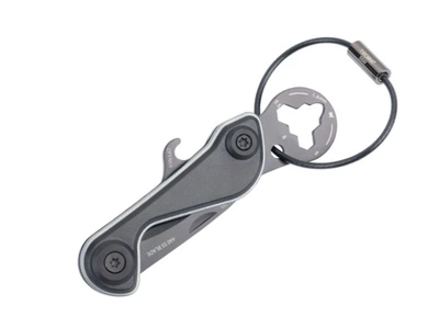 Мини-инструмент Troika PARCEL CUT-CART, с 9 функциями, карабин, титан
