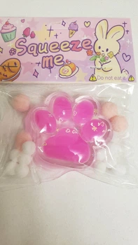 Игрушка-антистересс Kawaii Squishies Taba Сквиши Таба Лапка Котика прозрачная с ярко розовым