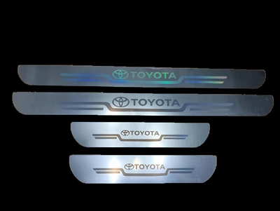 Захисні накладки на пороги для авто 4шт комплект Toyota білі (ТЮН114)