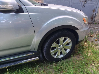 Mitsubishi Outlander 2006-2012 чорні накладки на арки (4 шт)