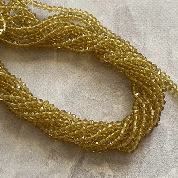 Бусина Рондель 4*3 мм, колір бежевий, 1-нитка ≈125-135 шт