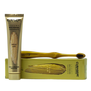 Зубна паста CURASEPT LUXURY WHITENING GOLD відбілююча 75 мл + зубна щітка косметичка