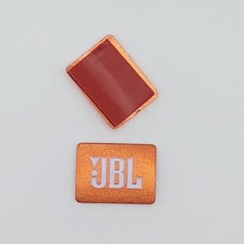 Эмблема JBL на сетку динамика (оранжевая) 2,0*1,5 см