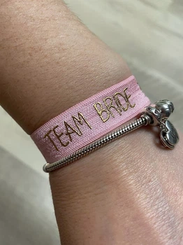 Резинка на руку, браслет для дівич-вечора 1шт "Team Bride" рожева з золотом (команда нареченої)