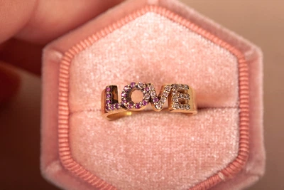 Каблучка LOVE з жовтого золота з фіанітами K-0156