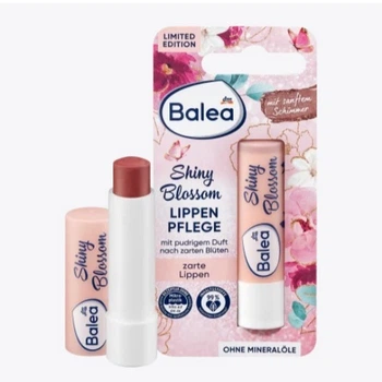 Зволожуючий бальзам для губ з маслом ши і реп'яховою олією Balea Shiny Blossom lippen pflege 4.8 g