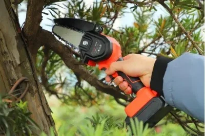 Мини пила Mini Electric Chain Saw для обрезки деревьев и распила дров 24V Оранжевая (81901YS827)