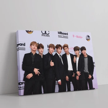Інтер'єрна картина БТС, біля стіни з логотипами, Bangtan Boys, BTS, кейпоп, 28×42 см (id2648)