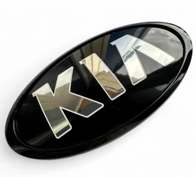 Эмблема LinkNexGen KIA черная (обод черный) 114х57 мм (скотч + 2 направляющие) 863183R500