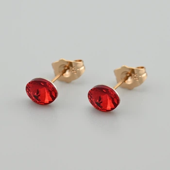 Сережки з кристалами Swarovski 53406 розмір 8х6 мм колір червоний вага 1.0 г позолота 18К