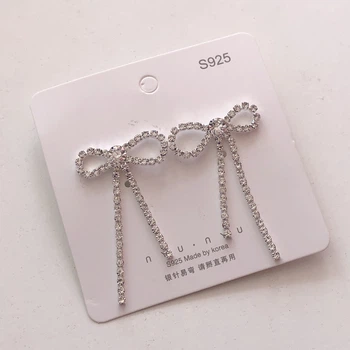 Cережки бантики цвяшки зі стразами Honey Fashion Accessories сріблястий (12-57)