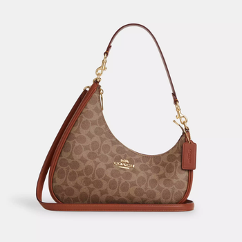 Жіноча сумка Coach Twisted Teri Shoulder Bag In Signature Canvas Signature Canvas/IM/Tan/Caramel