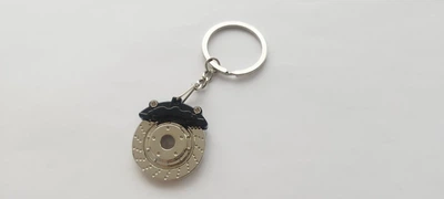 Брелок для автолюбителей металлические тормозные колодки серебристый
