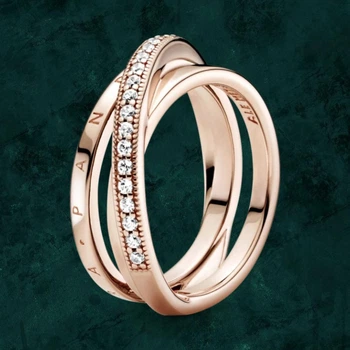 Серебряное кольцо тройное ленточное из паве Pandora (Пандора) 189057C01 с покрытием 14к золотом 18