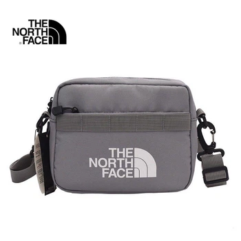 Мессендджер сумка через плечо The North Face серого цвета