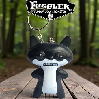 Пластиковый брелок Фуглер Fuggler Funny Ugly Monster (чёрно-белый монстр с пуговичным глазом) 7 см (Zuru, коллекционный)