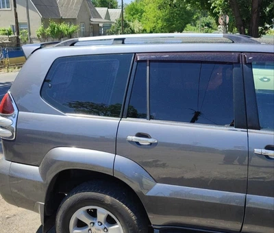 Toyota Land Cruiser Prado 120 Хромированные рейлинги с пластиковыми ножками