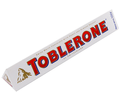 Шоколад Toblerone 100 г белый с медом и миндальной нугой