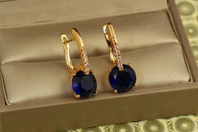 Серьги Xuping Jewelry Стрелка с большим синим камнем 2,7 см золотистые