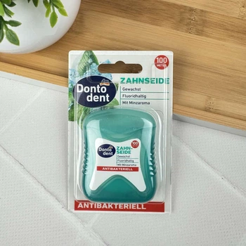 Зубная нить Dontodent Antibakteriell антибактериальная (вощеная с фтором, мятный вкус), 100 м