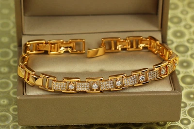 Браслет Xuping Jewelry вплетеная лента с камешками 17 см 7 мм золотистый
