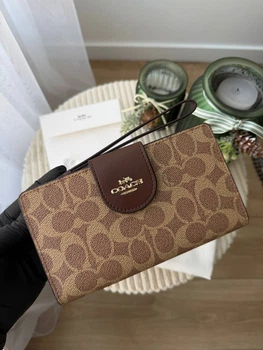 Гаманець книжка coach коричневий є відділення на телефон + подарункове пакування