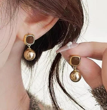 Сережки деликатные подвески 2.5х1 см jewelry Коричневые